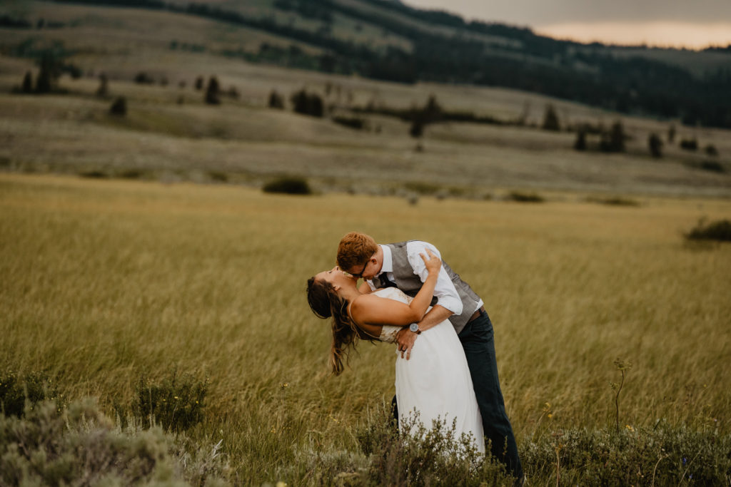 Bride and Groom in Yellowstone National park for adventure elopement