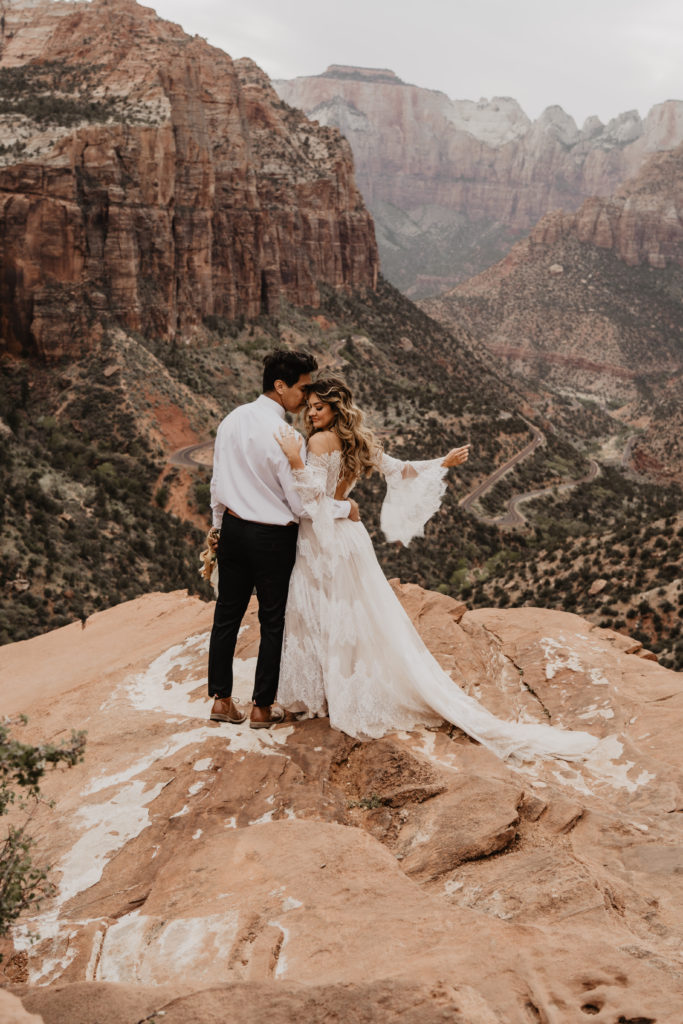 Zion national park elopement couple looking at view
