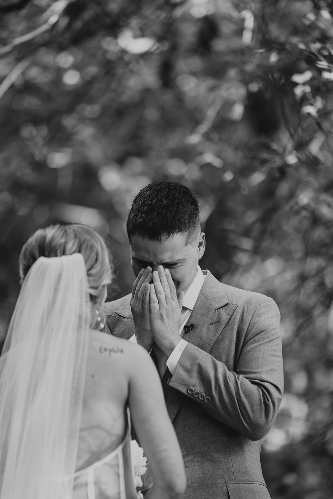 groom cried when he sees his bride during his first look at his own wedding